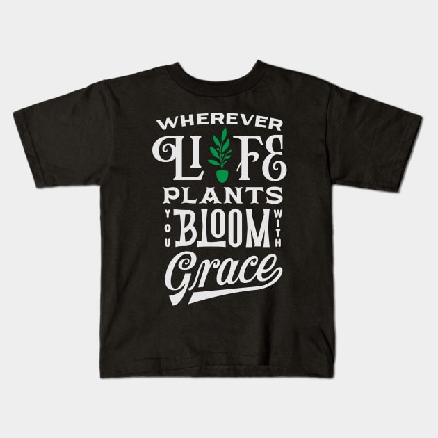 Wherever life plants you, bloom with grace Kids T-Shirt by davidnovrian